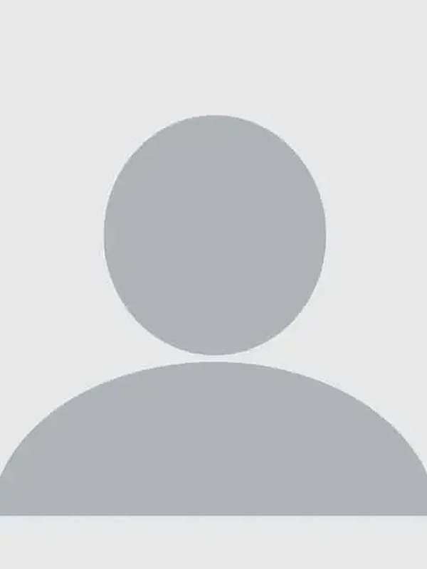 A gray silhouette placeholder image of a person.